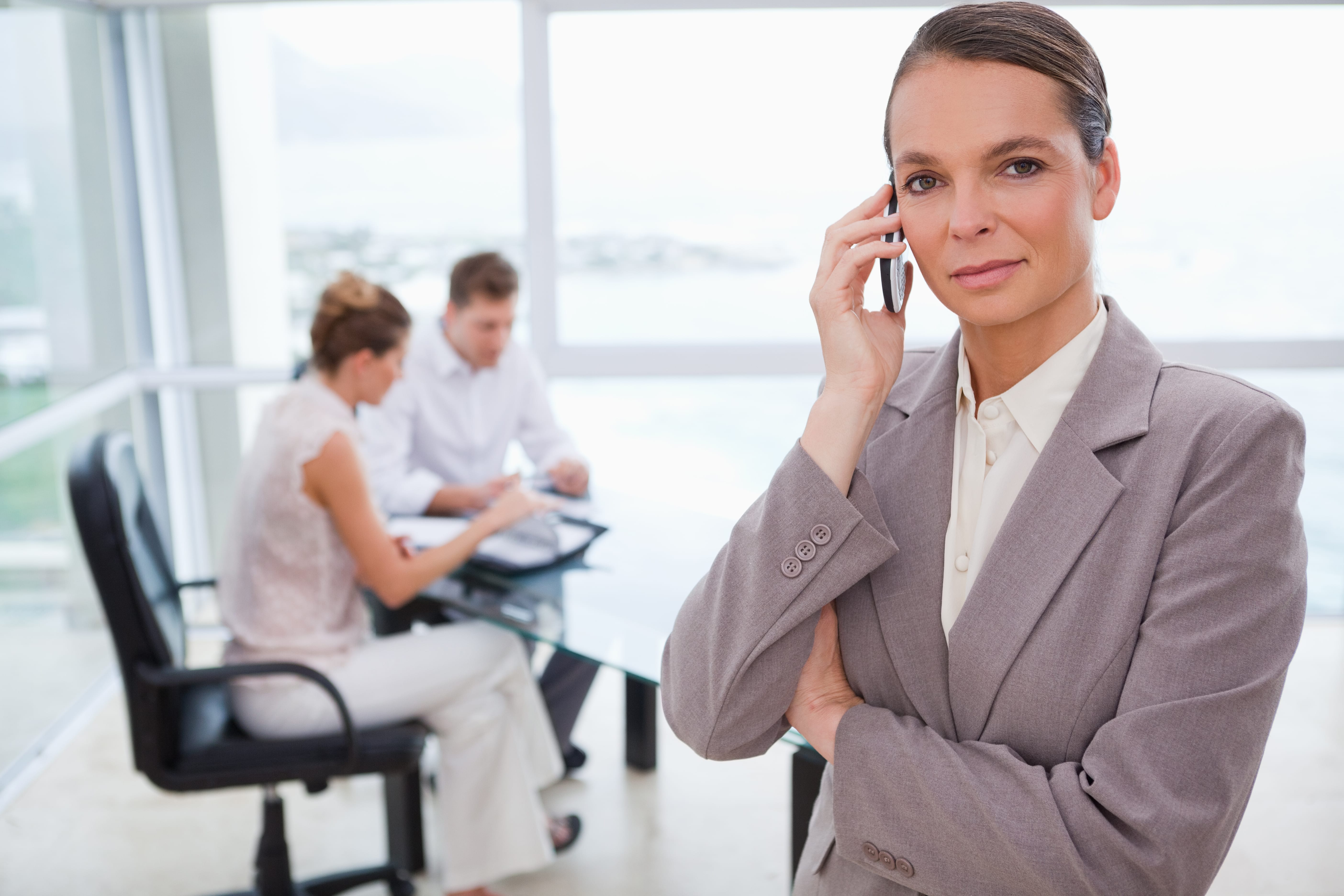 Lawyer making a phone call for her clients.