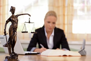 Attorney sitting at table working