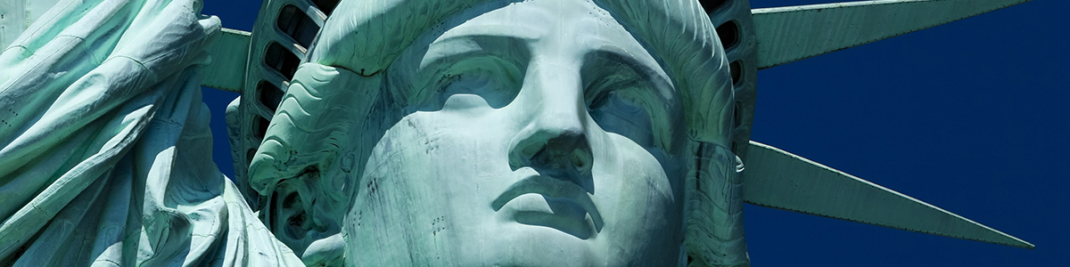 Close-up view of the Statue of Liberty's face.