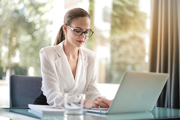 Young employee at desk